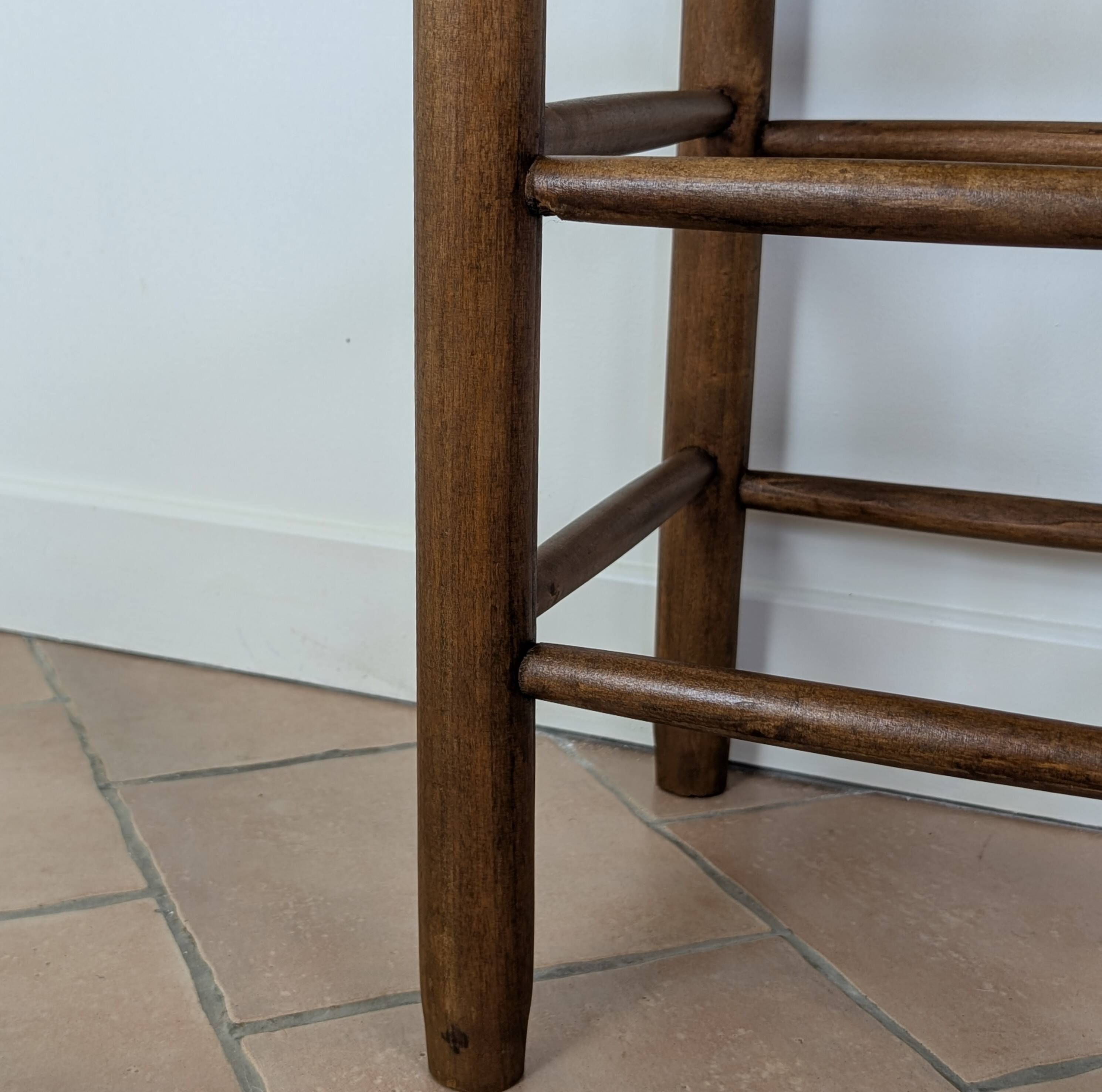 High wooden and straw stools