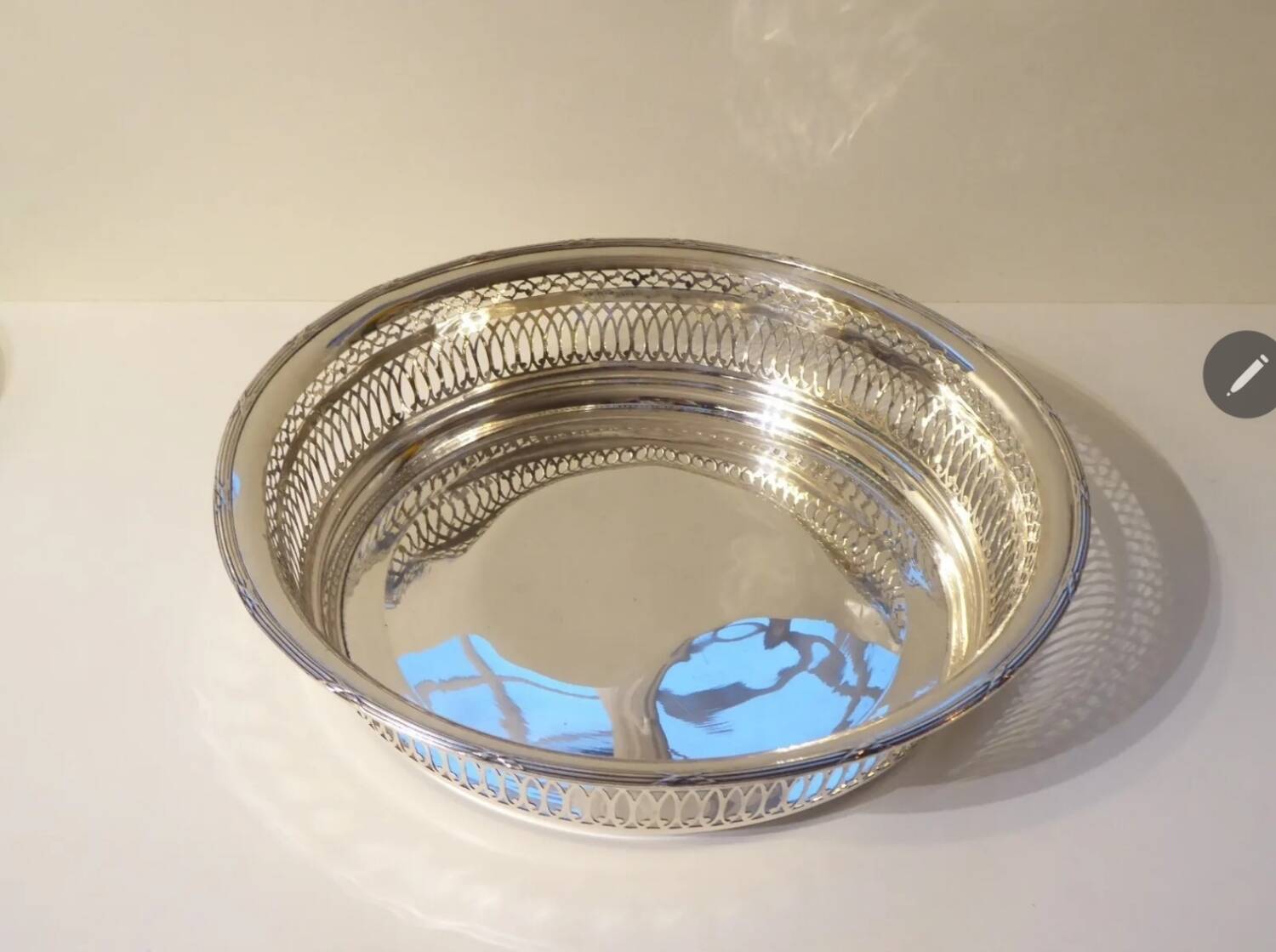 Large openwork basket in silver metal