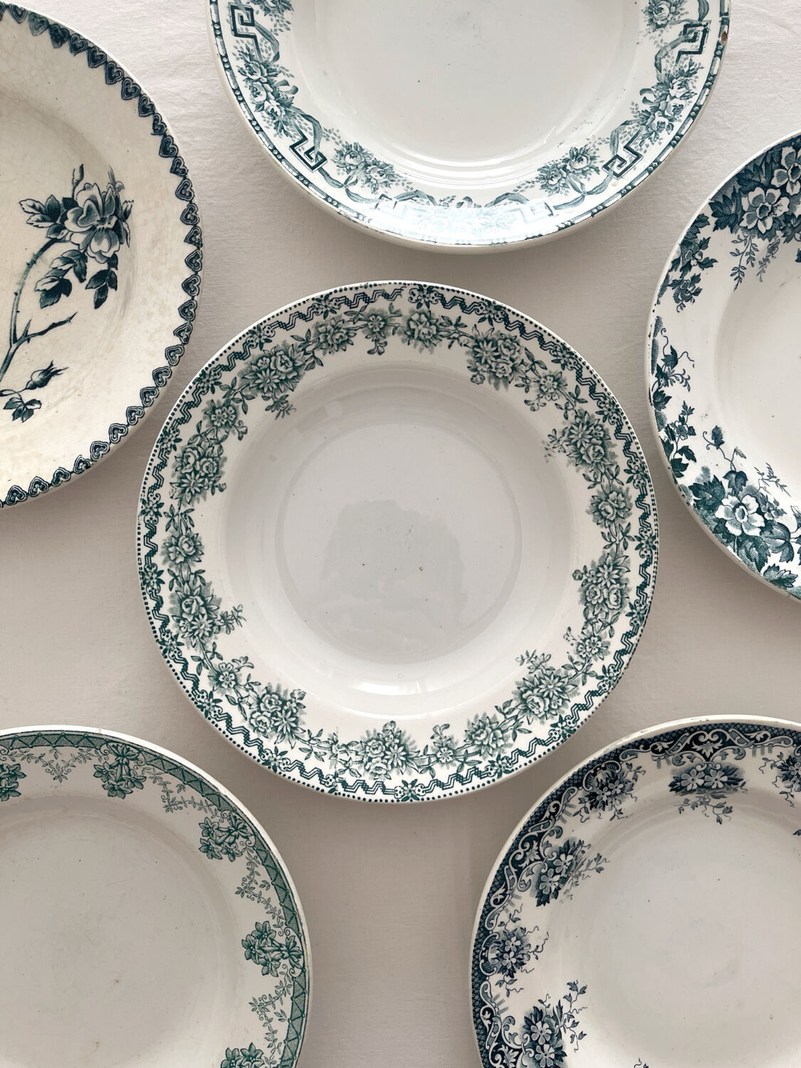 6 mismatched ironstone soup plates from Saint Amand
