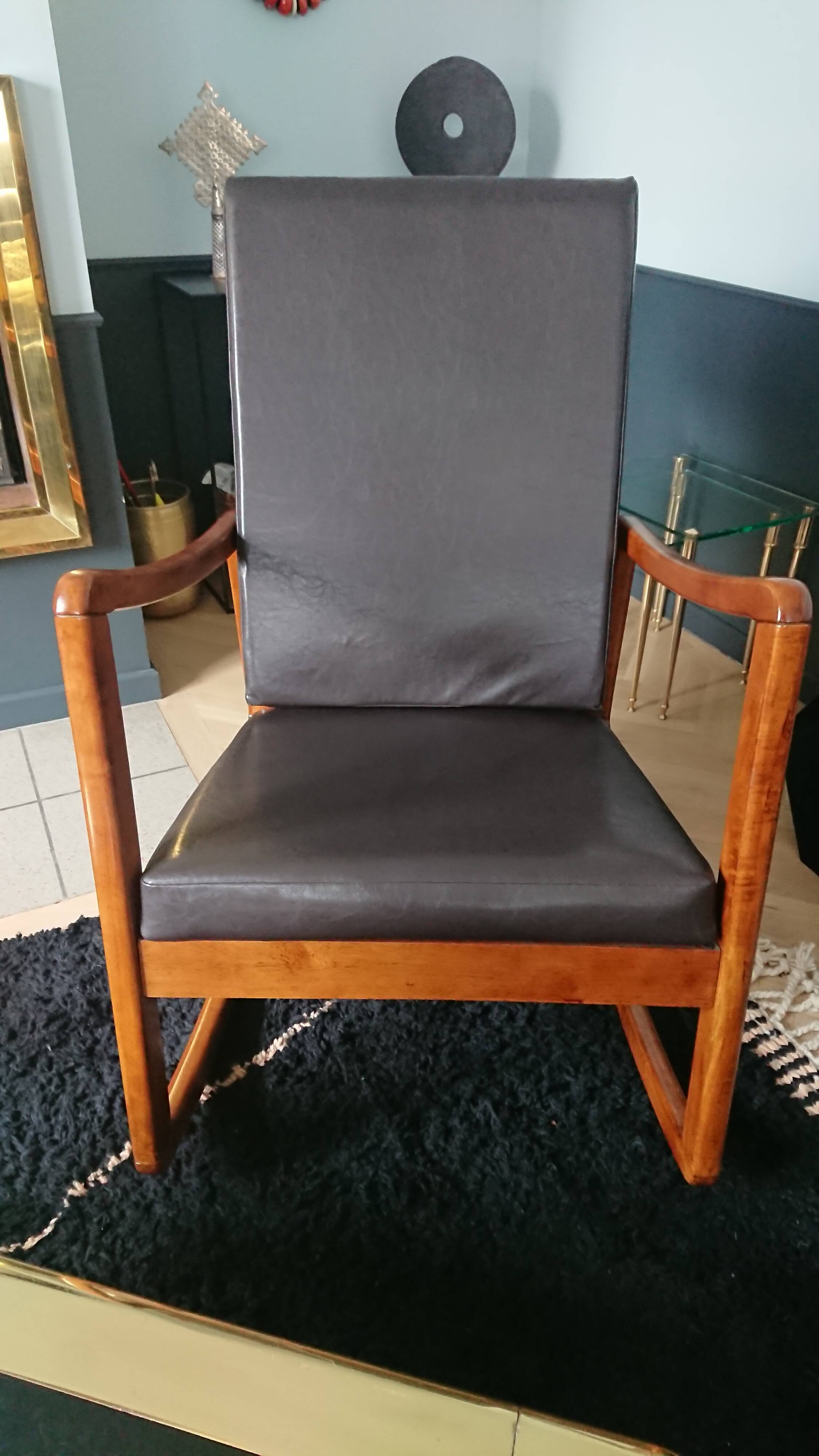 Rocking-chair in teak and skai