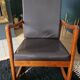 Rocking-chair in teak and skai