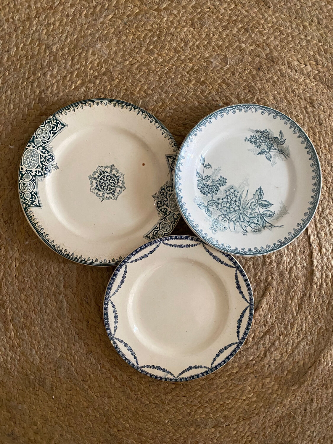 3 mismatched iron earth flat plates in green.