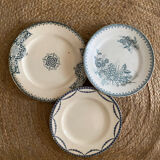 3 mismatched iron earth flat plates in green.