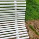 Antique garden bench with metal legs
