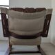 Leather and wood armchair, brutalist style.