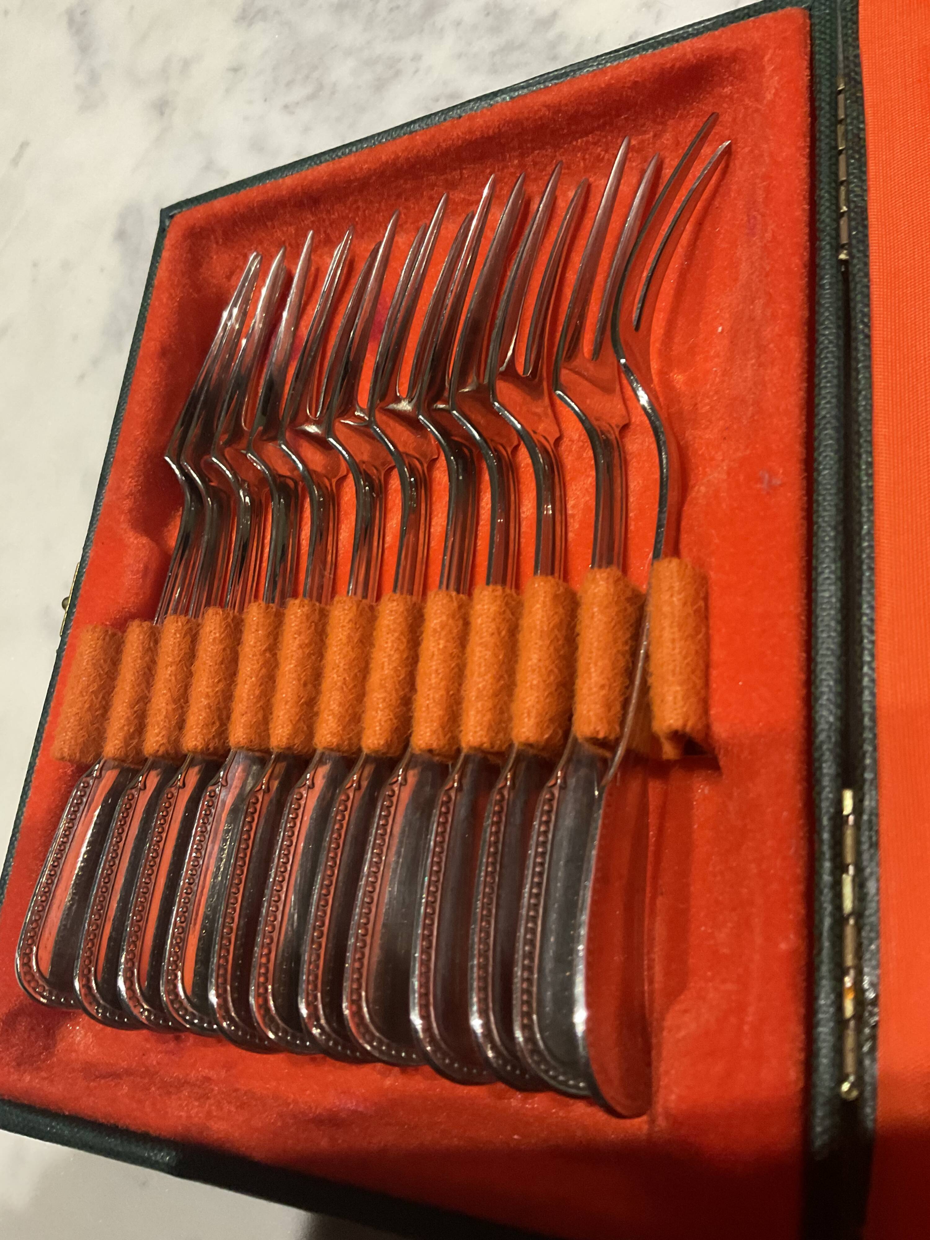Set of 12 snail forks. Guy Degrenne