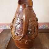 Beauvais sandstone pitcher decorated with a prizery