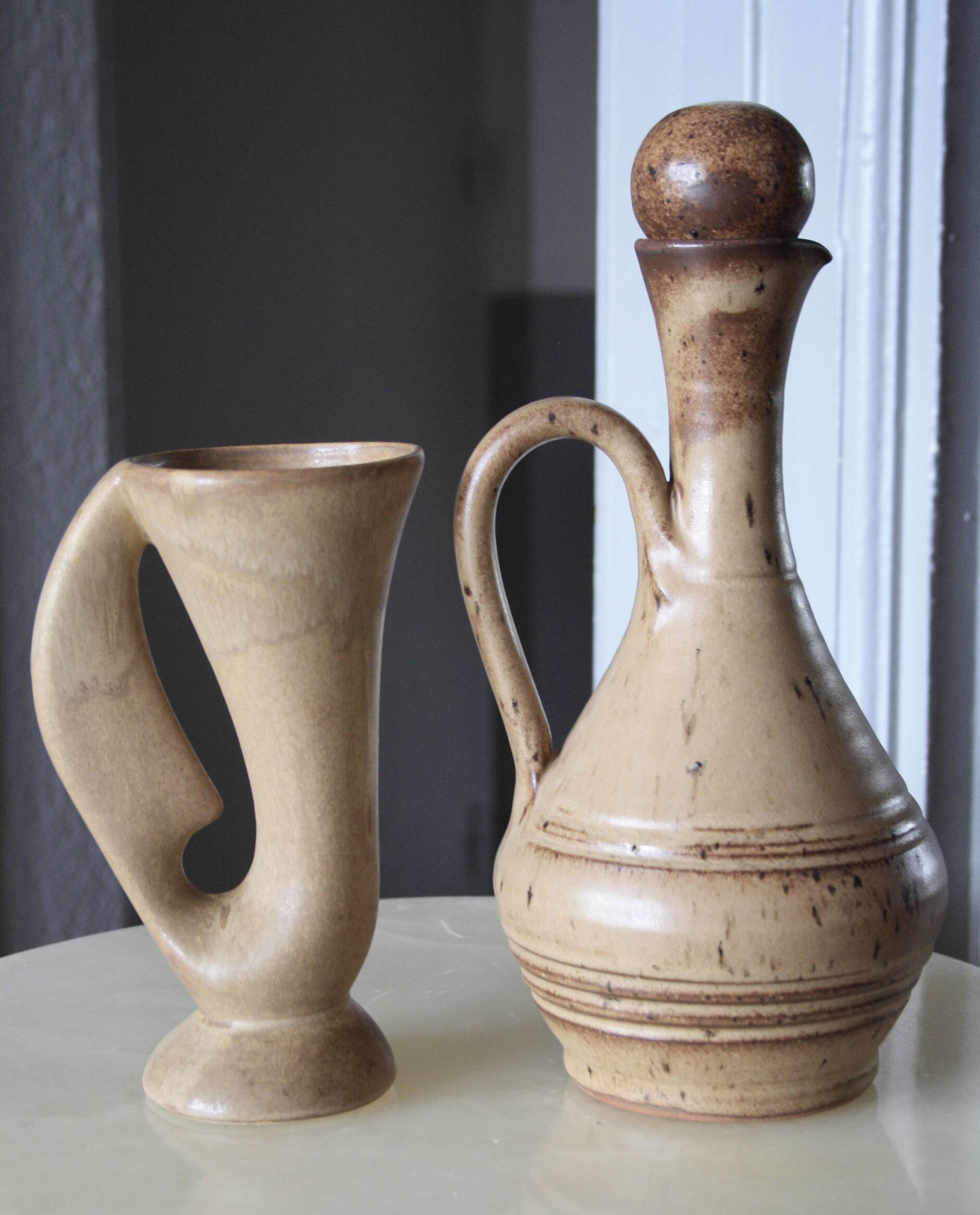 Set of 2 antique stoneware carafes/pitchers