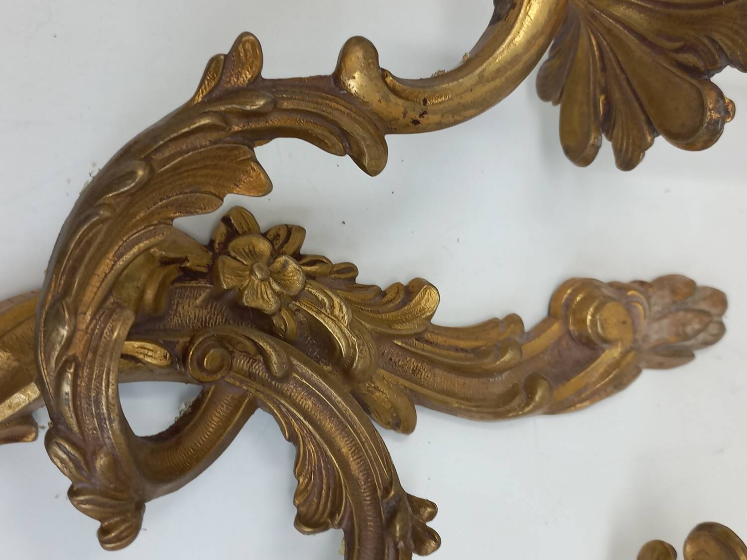 Pair of Louis XV style two-light bronze wall sconces