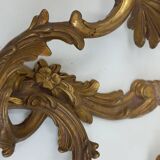 Pair of Louis XV style two-light bronze wall sconces