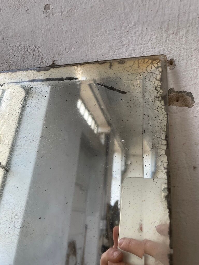 Very stung old bevelled mirror 39x60cm