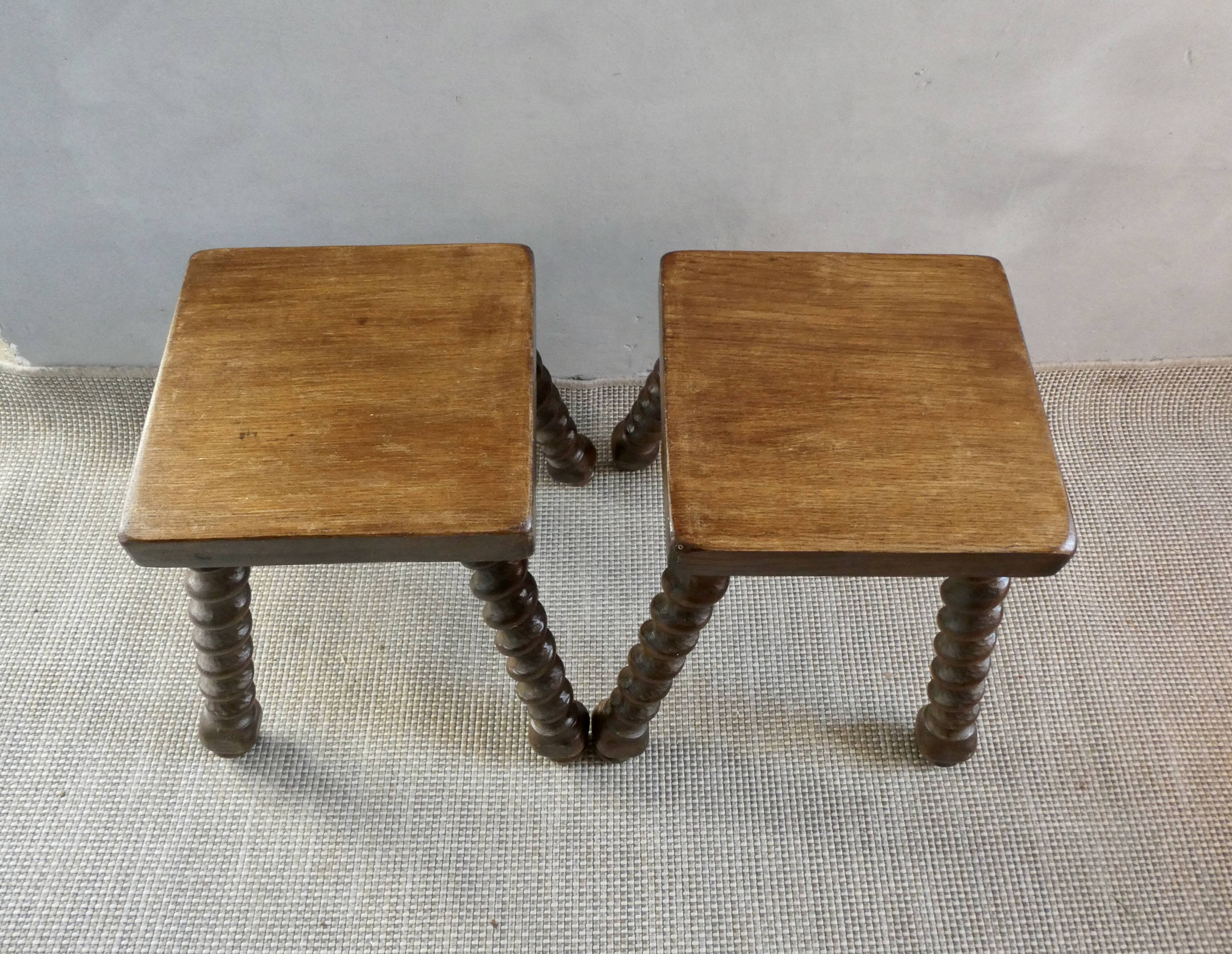 Pair of solid wood stools, carved legs