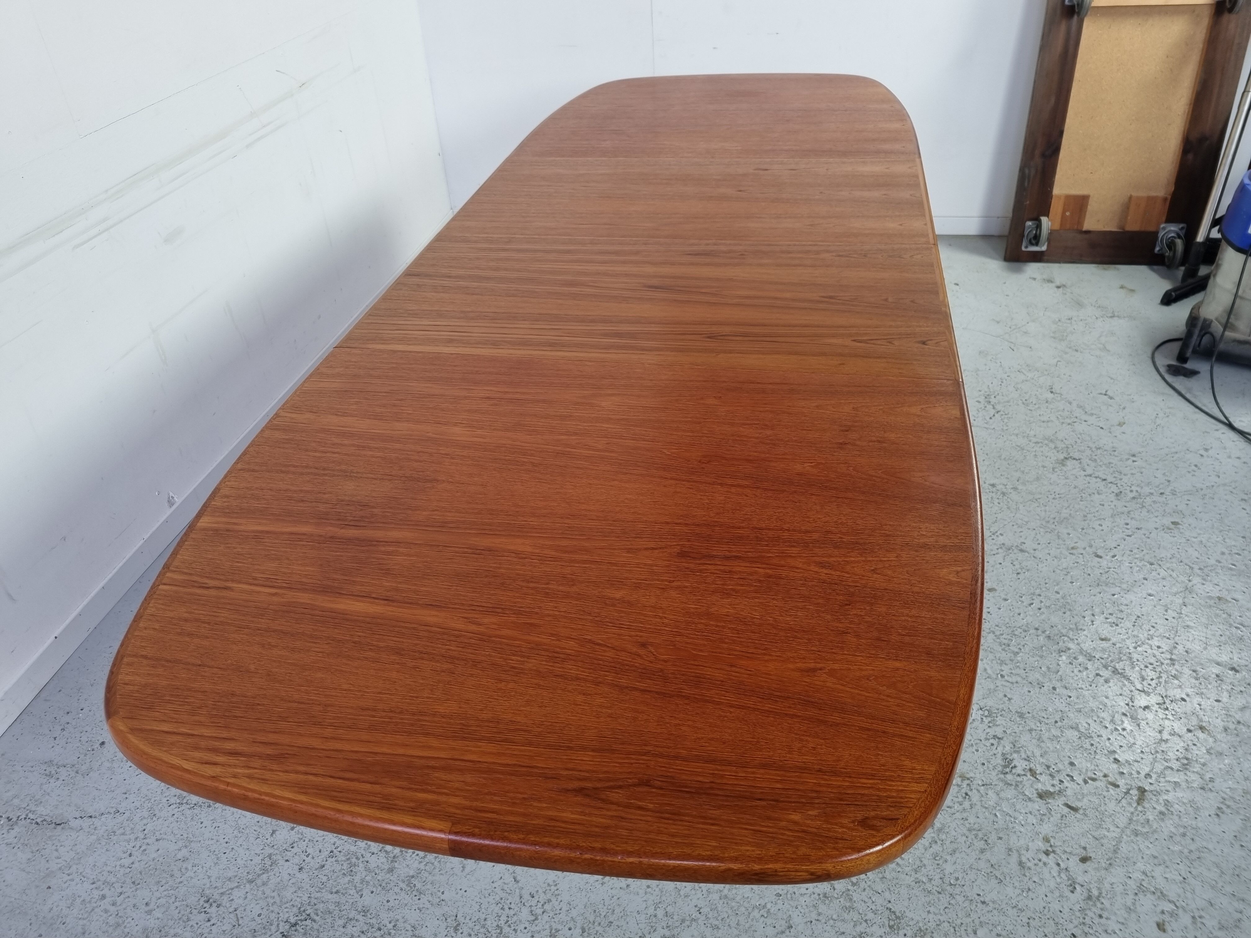 Extendable teak dining table from Dyrlund, Denmark 60s