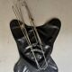 designer butterfly armchair in chrome and black leather