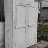 Old rustic Parisian wardrobe patinated white in oak and fir