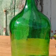 Superb antique green glass demijohn.