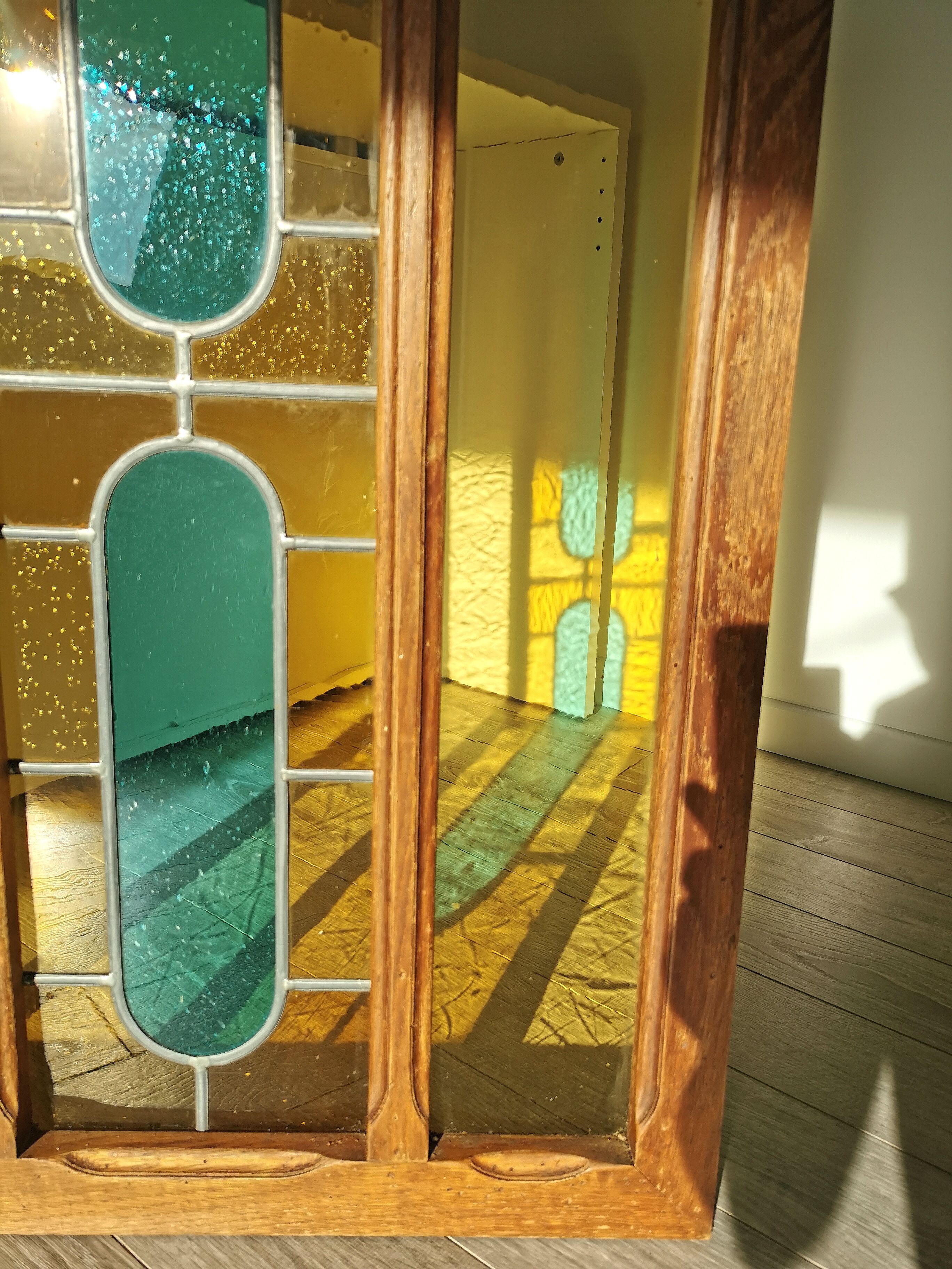 Stained glass window with framing