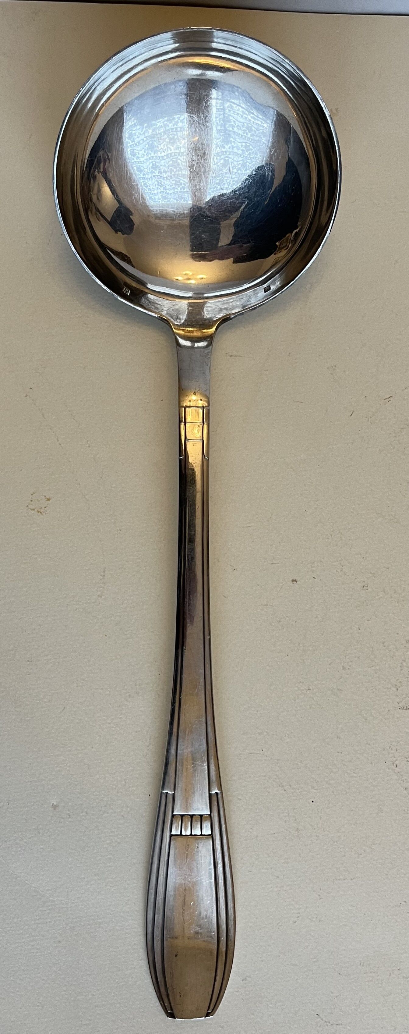 Silver metal ladle