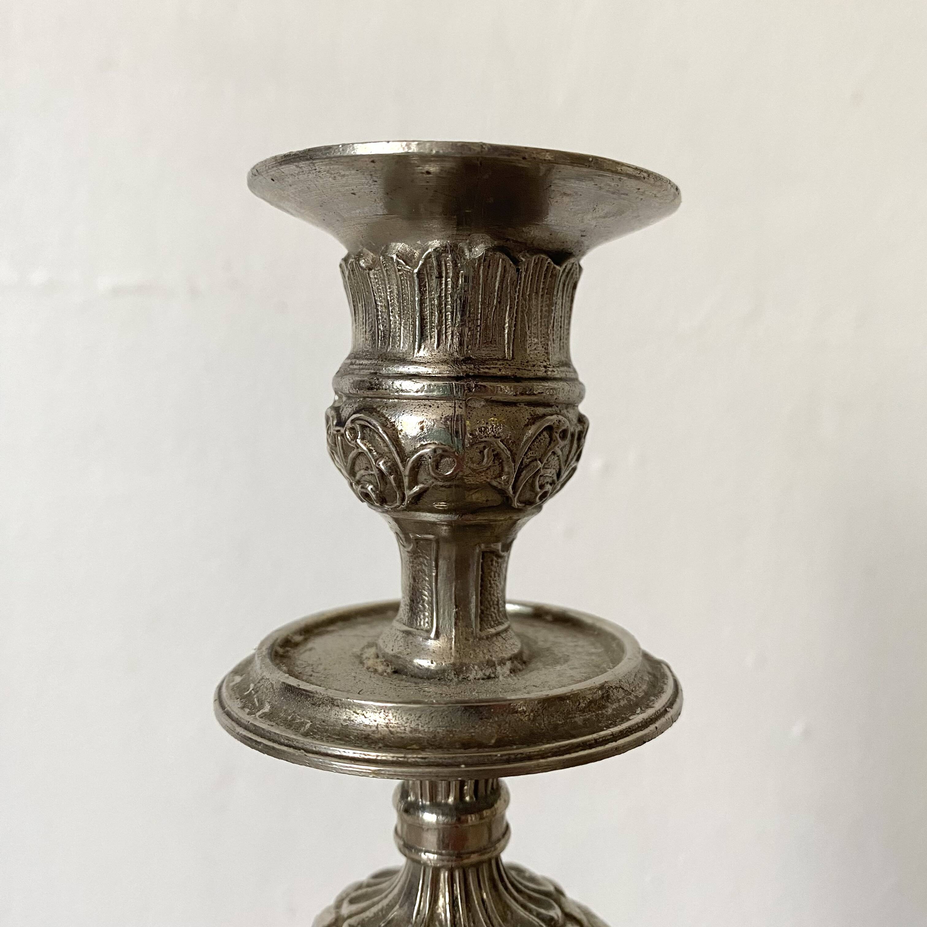Pair of old silver-plated candlesticks