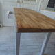 Farm table, leg and belt patinated pearl gray, waxed top medium oak.