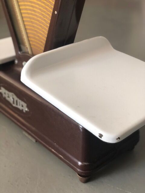 Vintage merchant's scale in bakelite burgundy