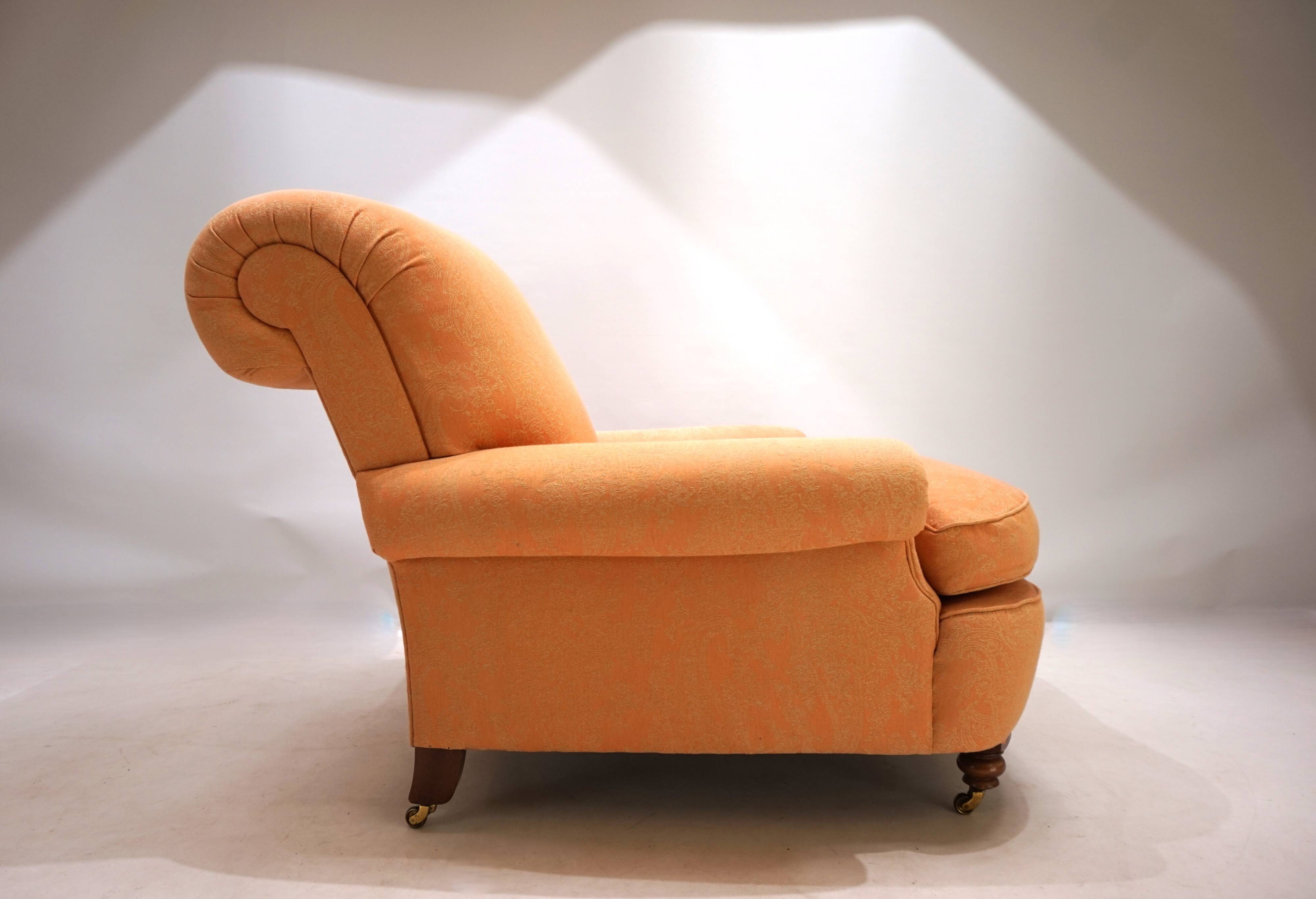Deep seated armchair in the style of Howard & Sons