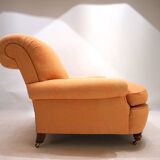 Deep seated armchair in the style of Howard & Sons