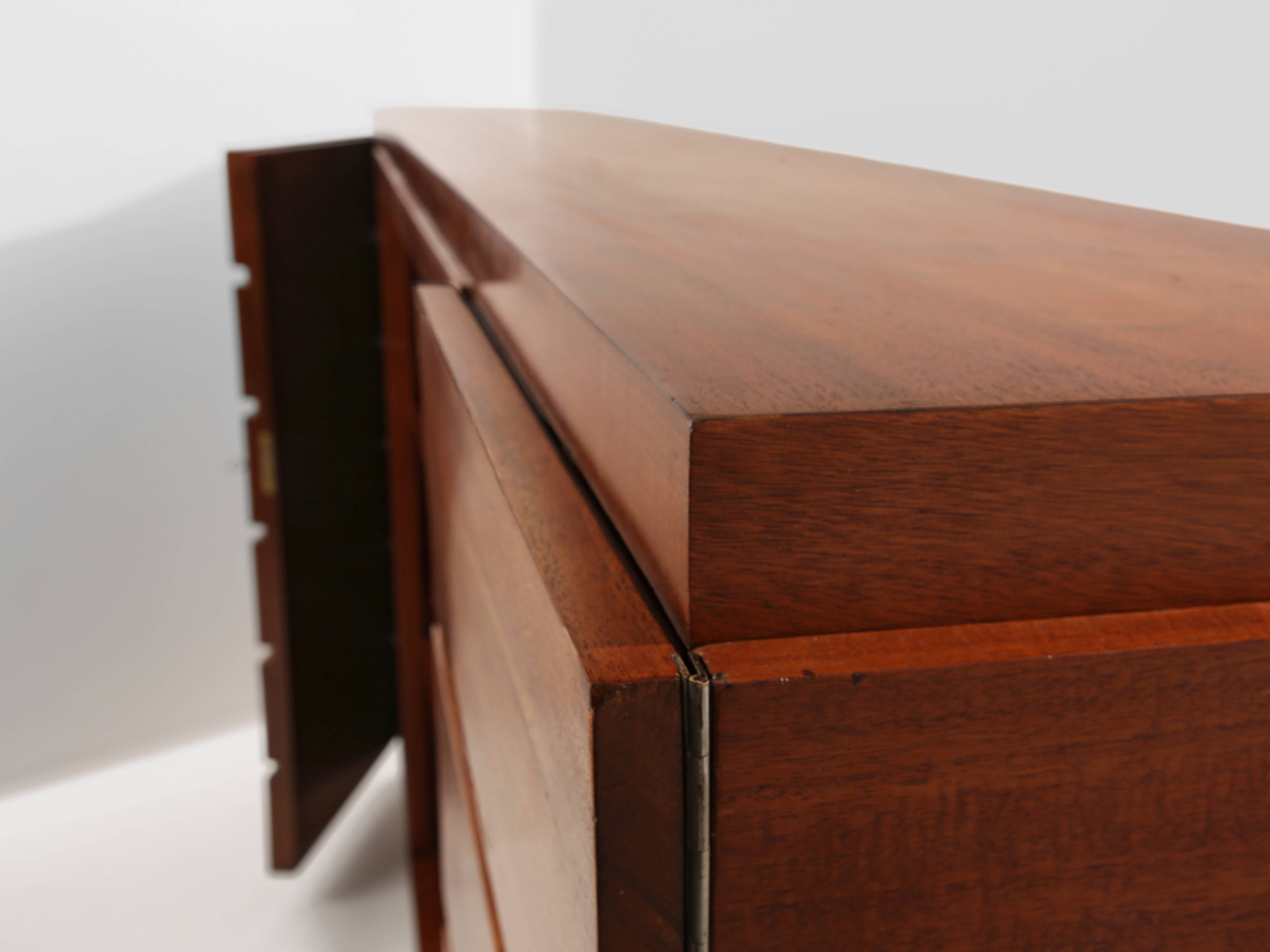 Large modernist cabinet with two doors in mahogany from around 1940.