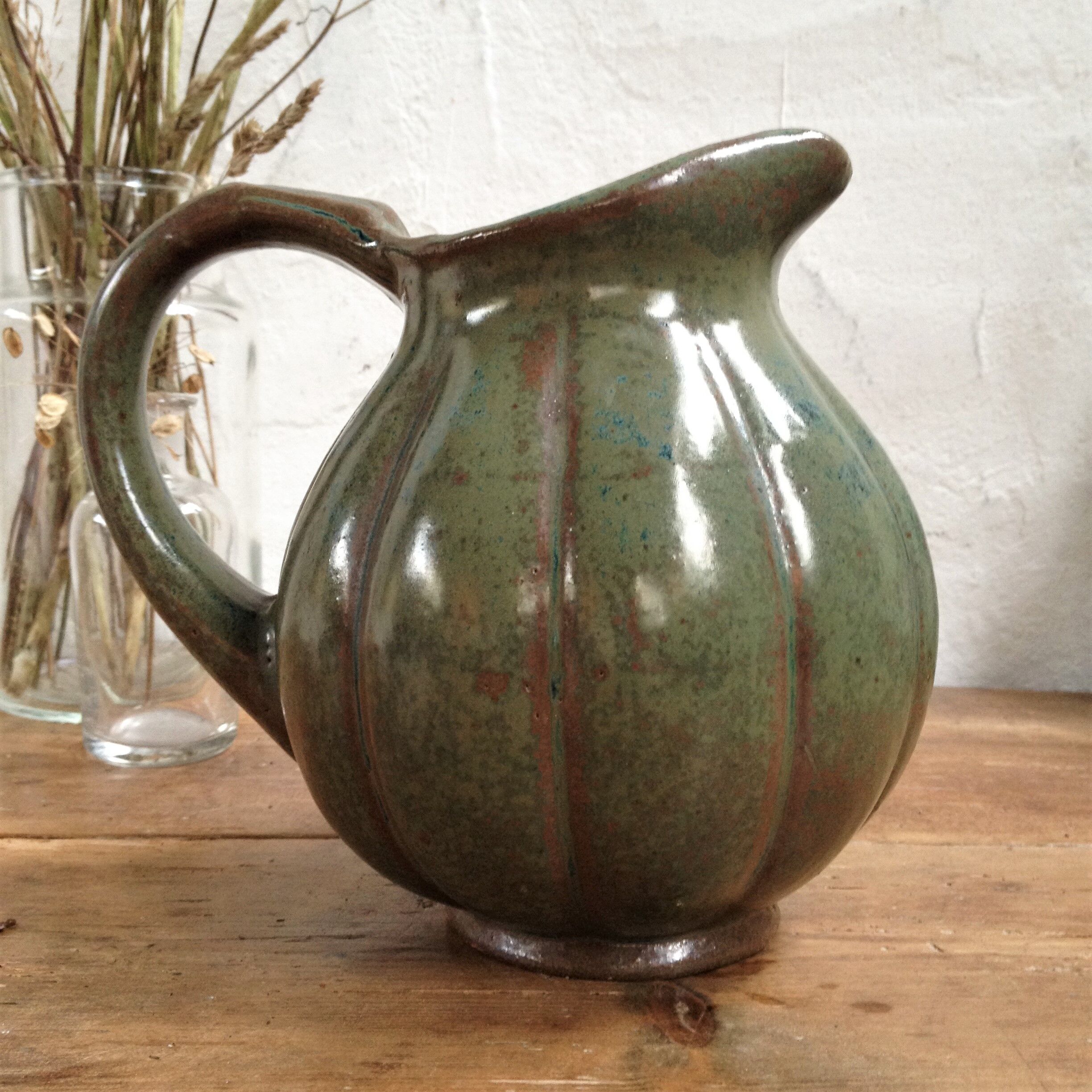 Green enamelled sandstone pitcher