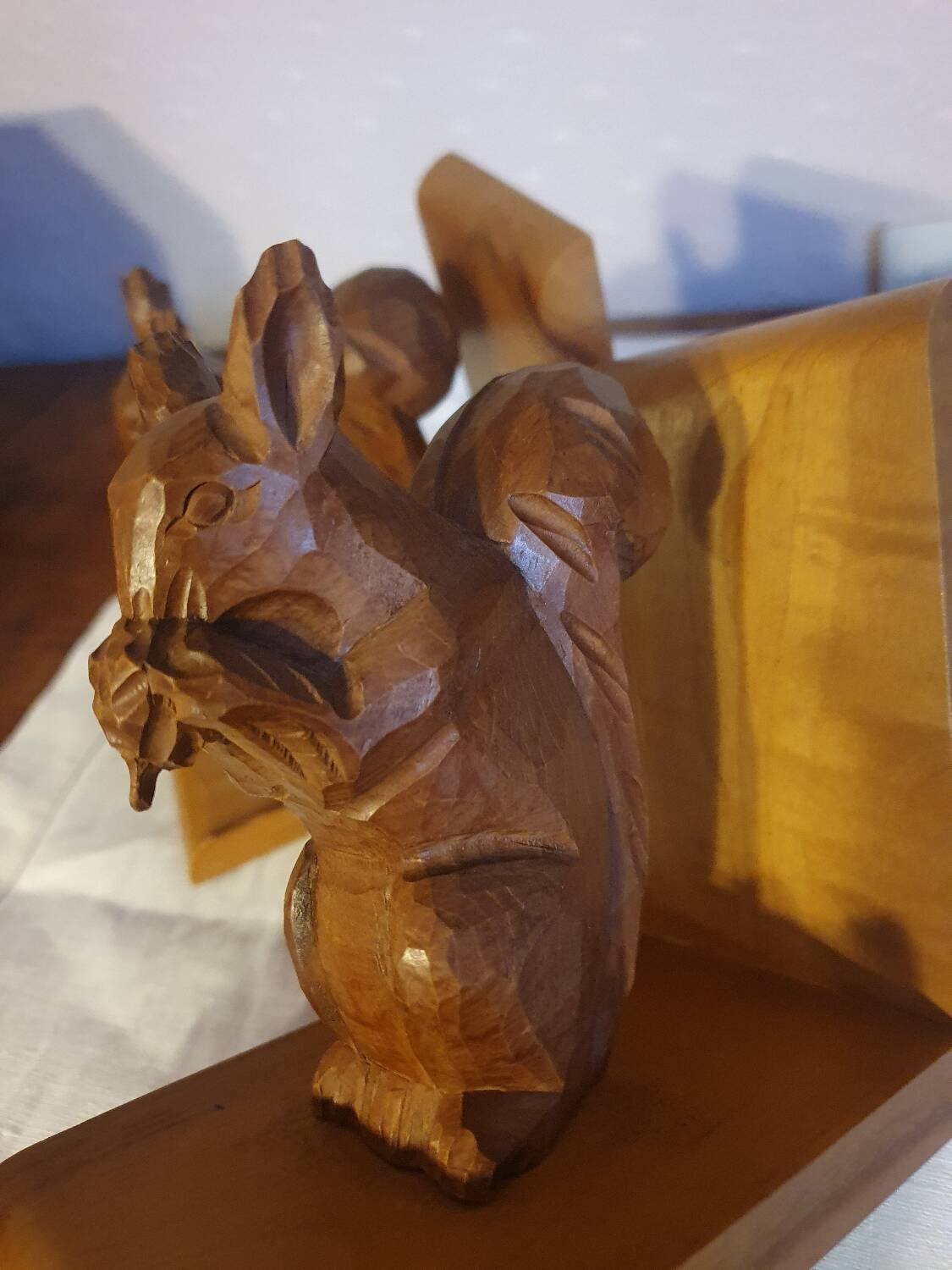Vintage hand-carved wooden squirrel bookend