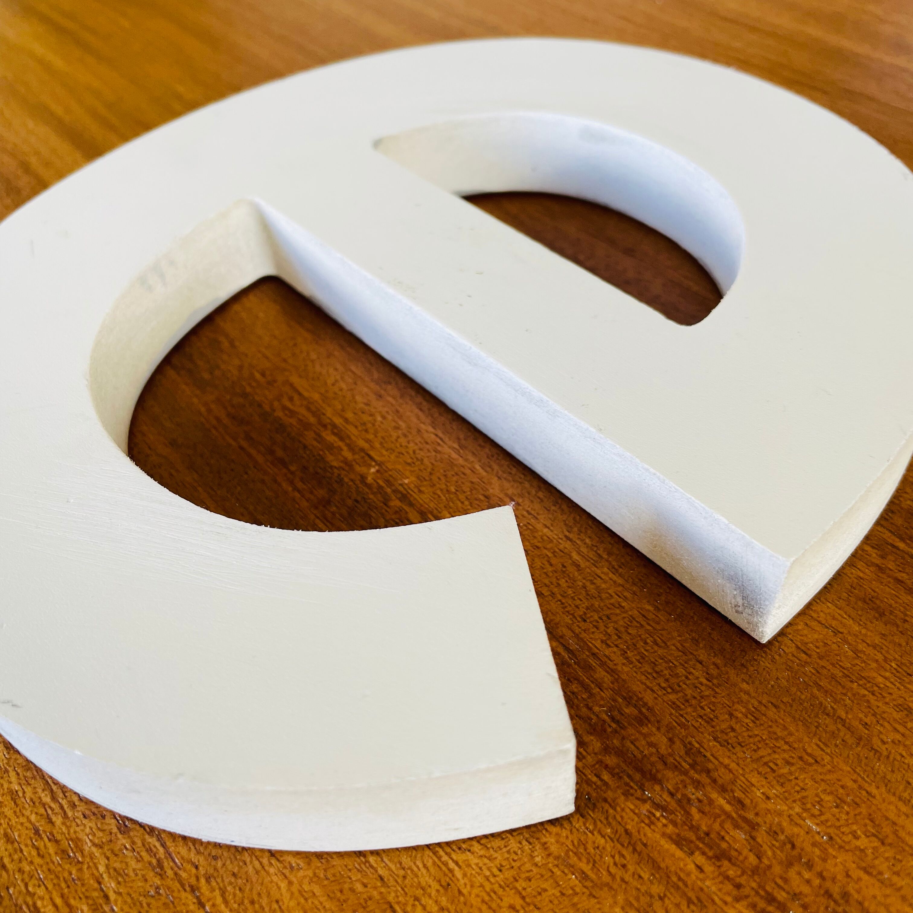 Wooden sign letter "e"