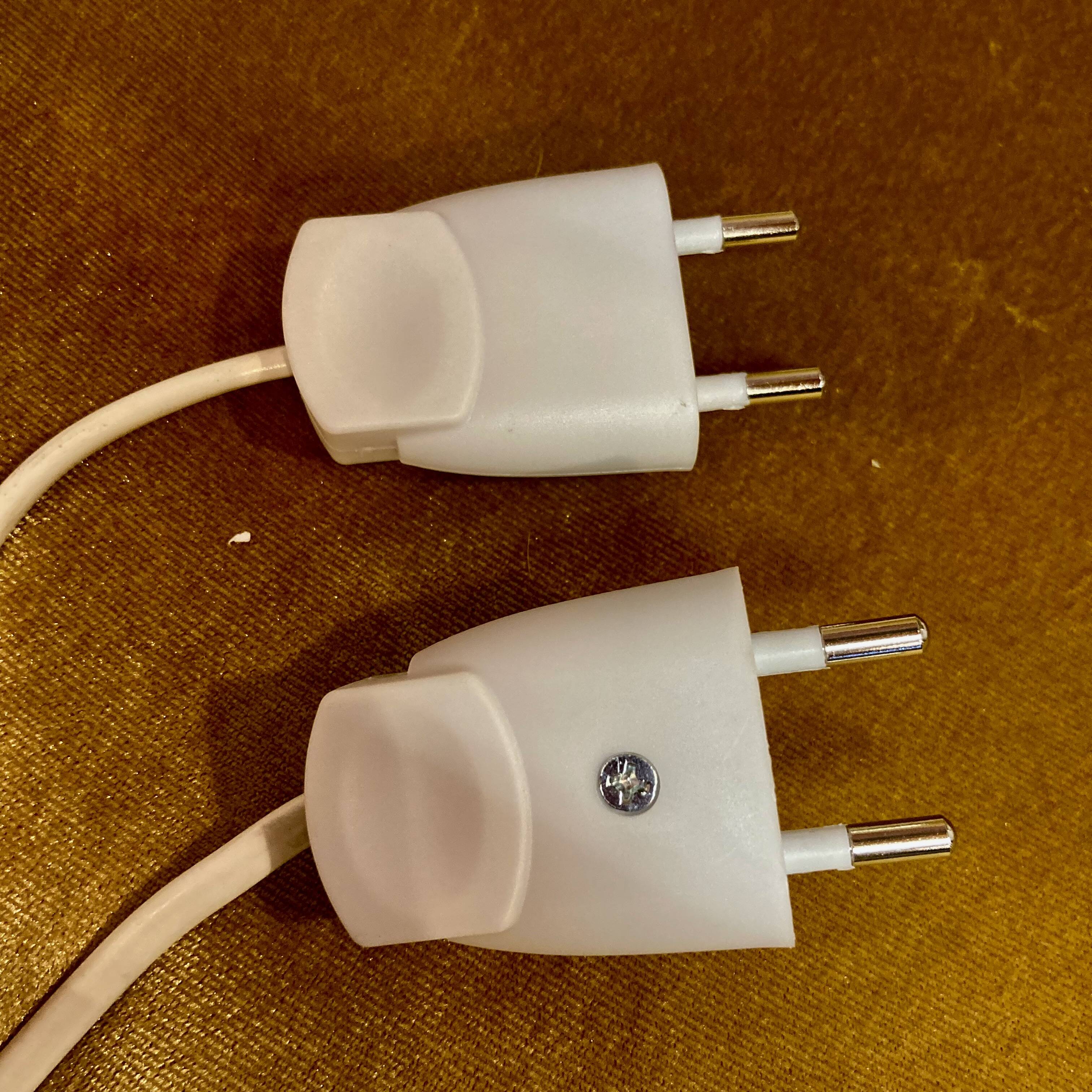 Pair of large modular industrial lamps from the 1950s.