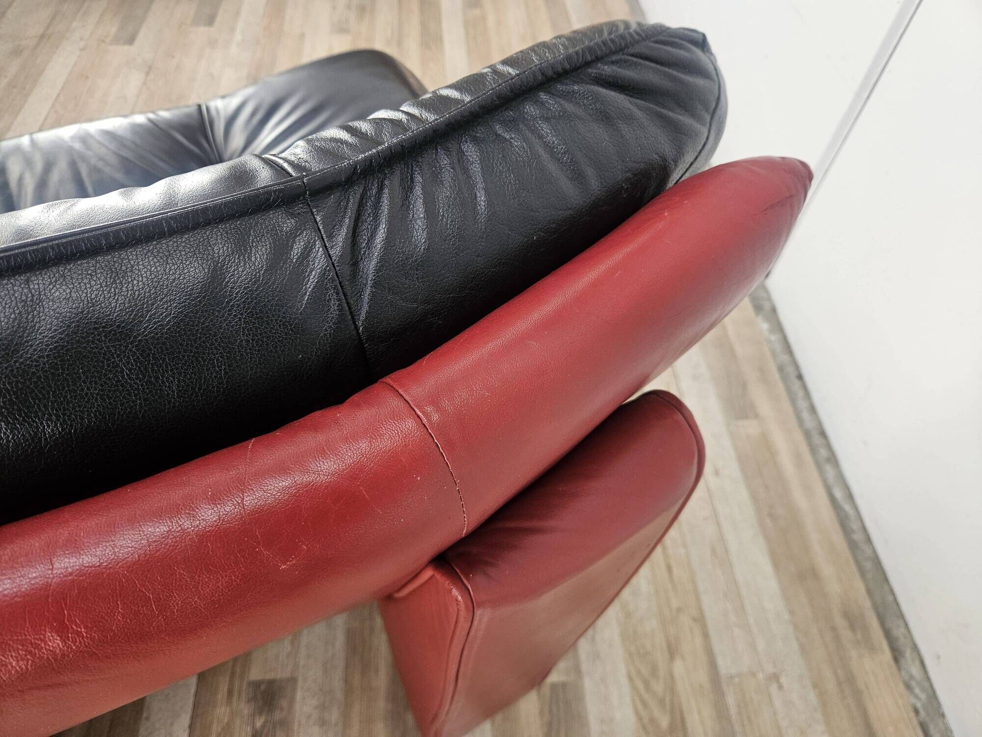 Red and black leather armchair by Nicoletti Salotti