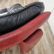 Red and black leather armchair by Nicoletti Salotti