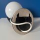 Vintage wall sconce with black hand and white opaline glass globe, 1970s L