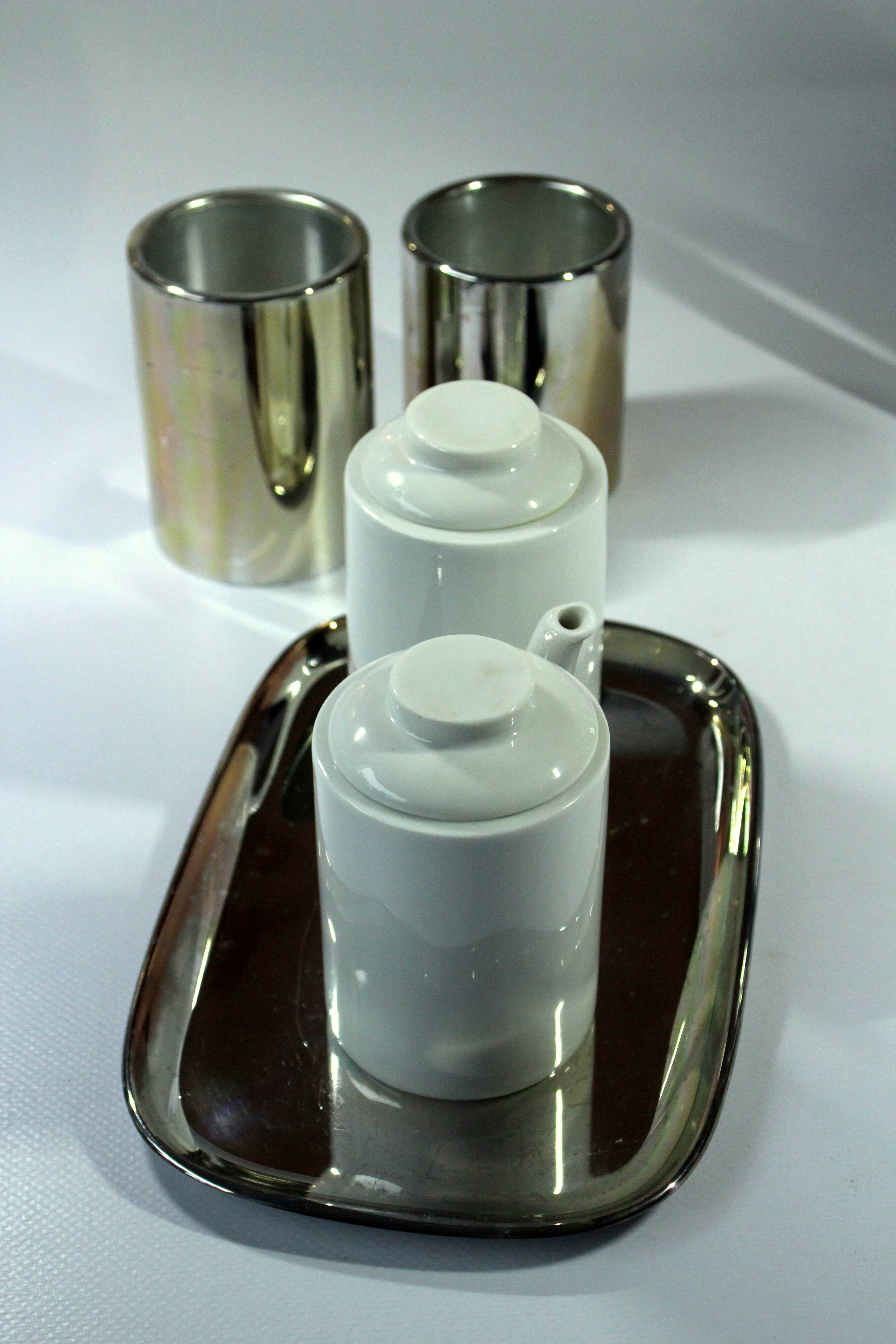 Coffee pot with metal isolated warming hood as a set with milk jug and sugar bowl, Vintage