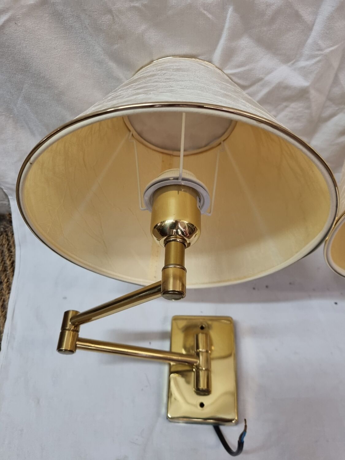 Gilded brass hinged sconces