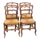 4 Louis XV chairs in solid carved oak with rush seats from the 19th century.