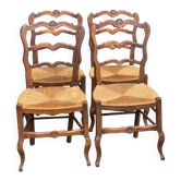 4 Louis XV chairs in solid carved oak with rush seats from the 19th century.