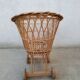 Rattan cradle for doll on vintage wheels