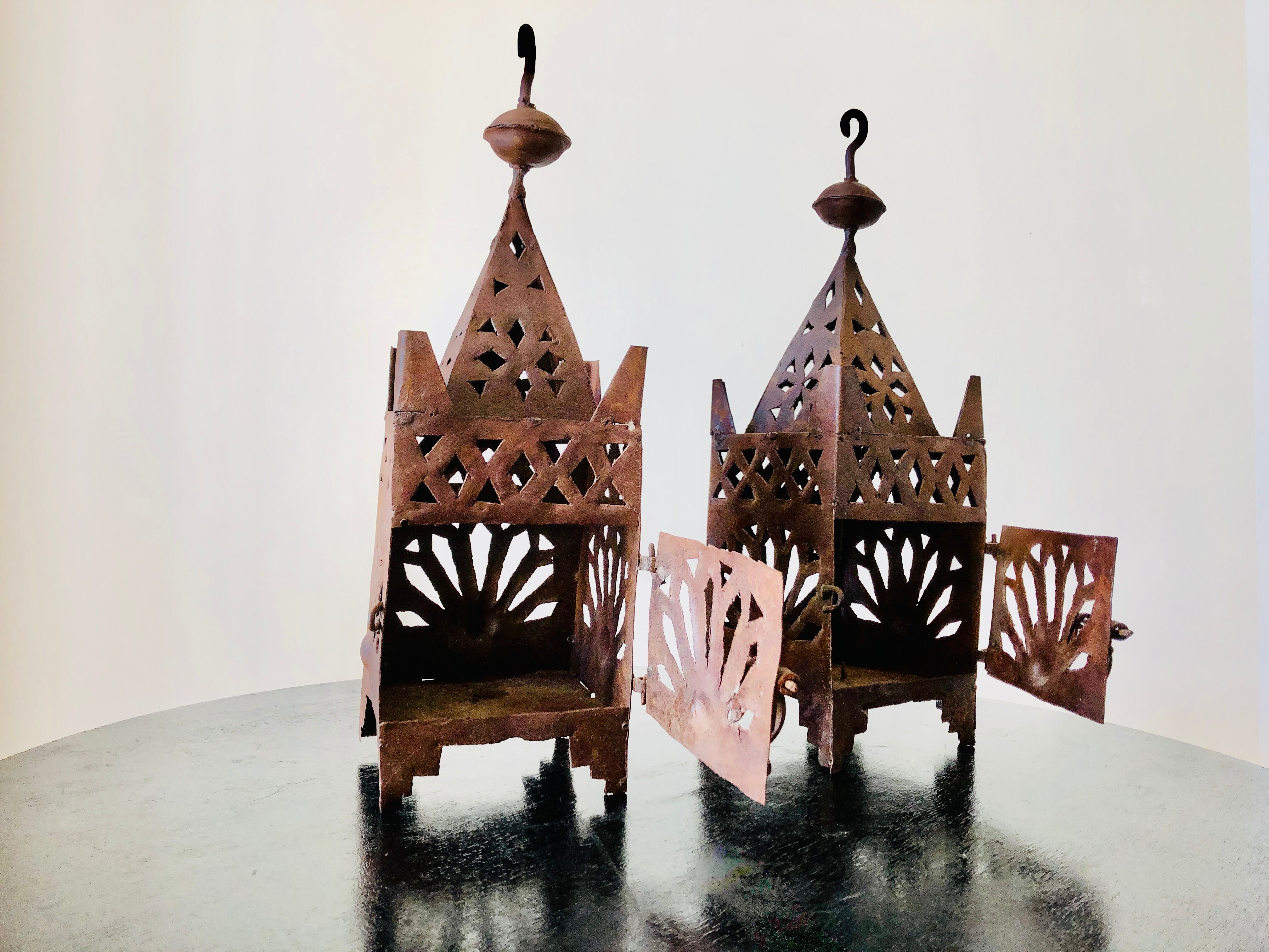 Pair of wrought iron lanterns