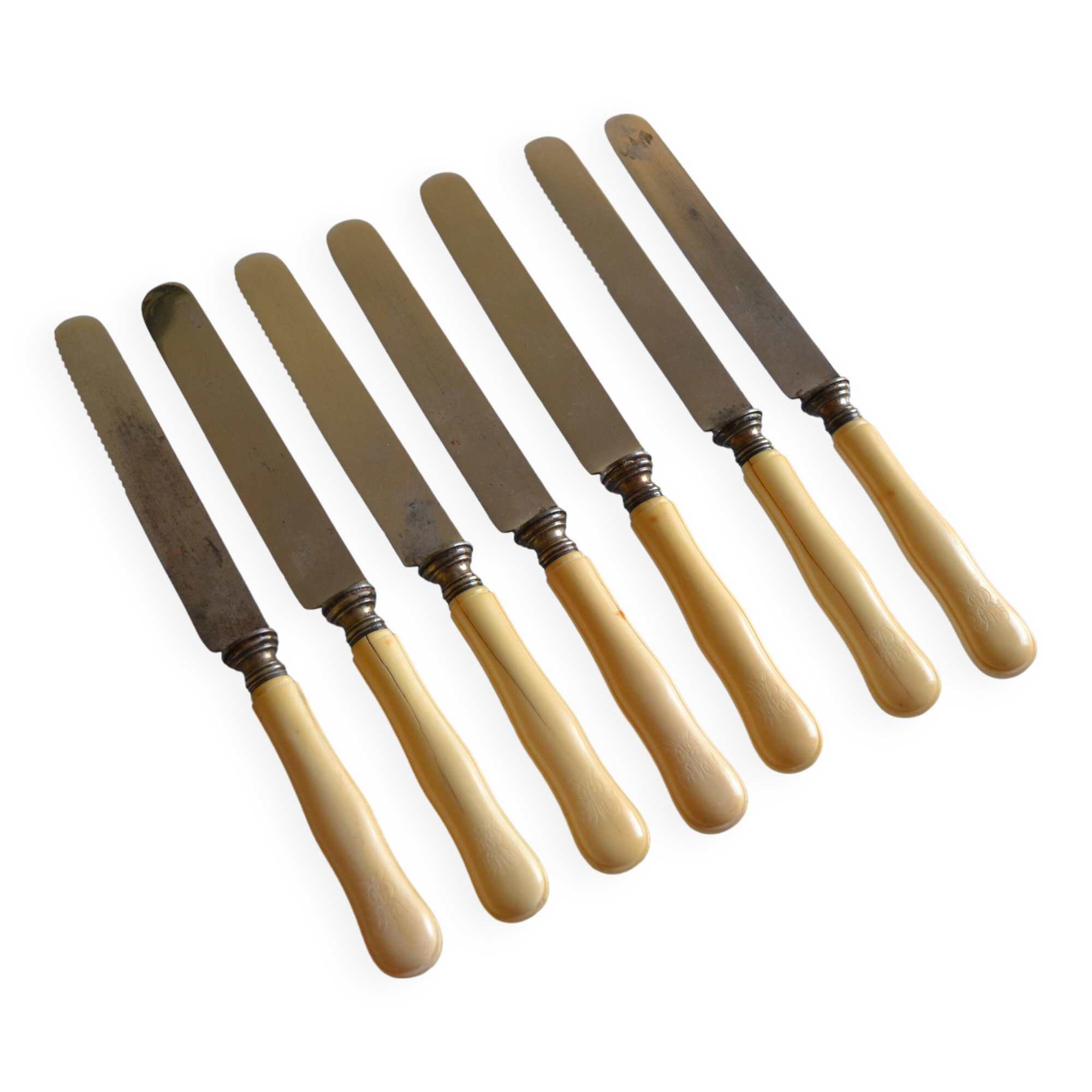 7 old table knives from the 19th century, monogrammed ivory-colored handles