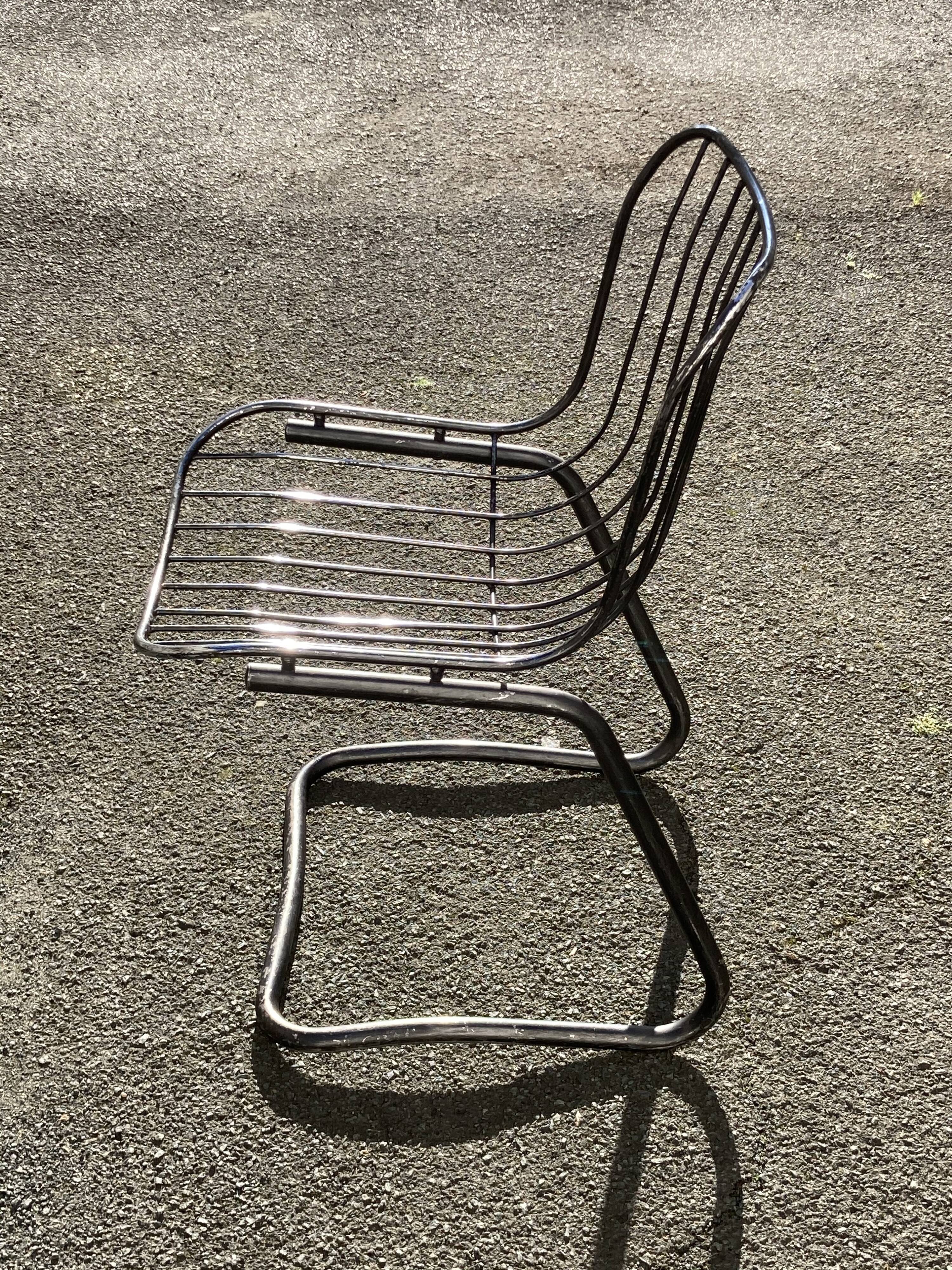 Two chairs in chrome metal