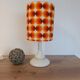 Table lamp in a seventies style | orange psychedelic round lampshade