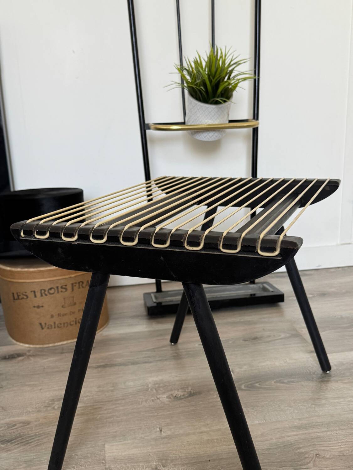 Vintage black Georges Tigien stool