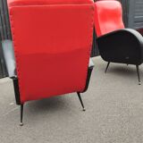 Pair of red and black faux leather armchairs