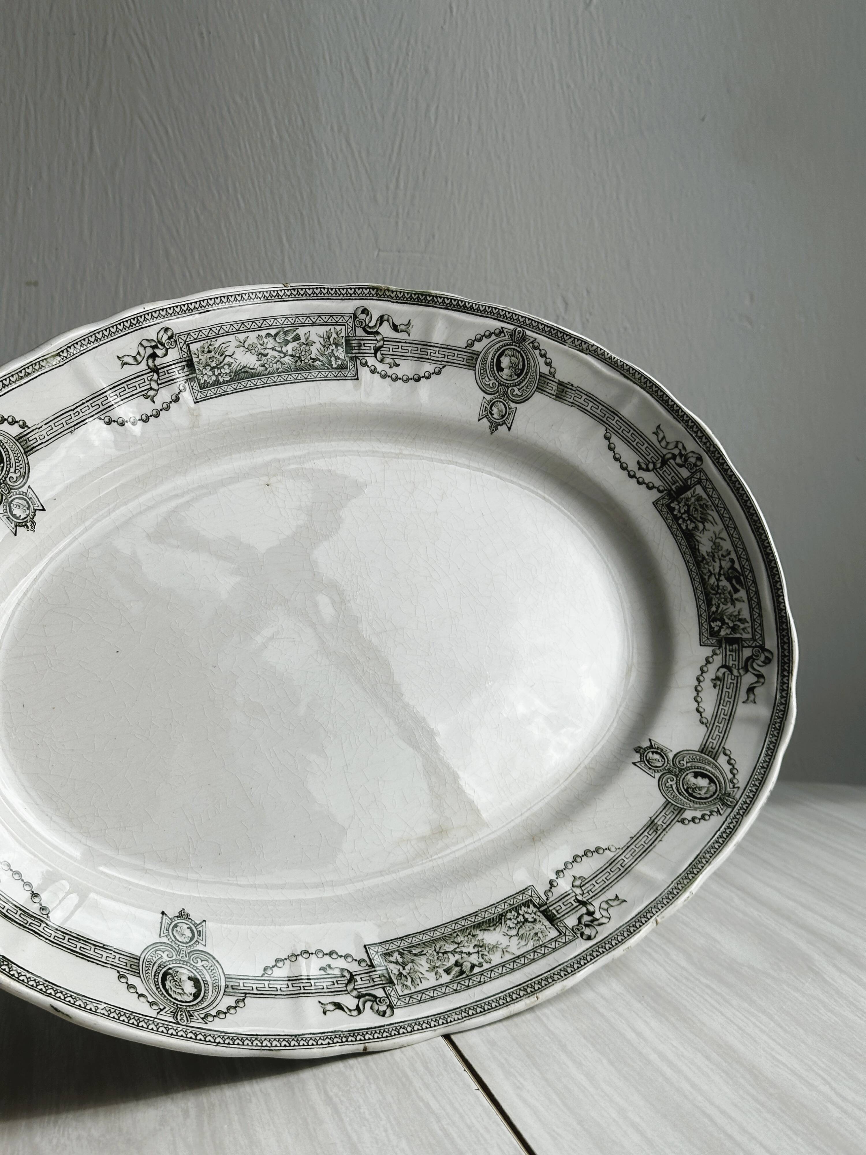 Antique oval earthenware dish, black and white neoclassical decor