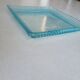 Empty blue glass pocket