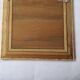 Antique oil painting depicting a marine scene.
