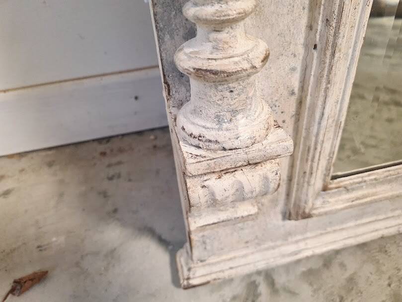 Beveled mercury patinated trumeau mirror